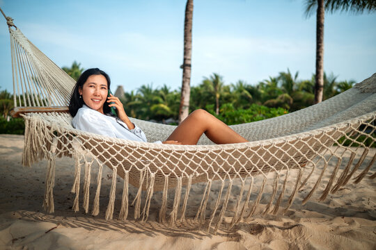 Representing reliable travel assistance, connectivity at a peaceful beach resort on summer vacation