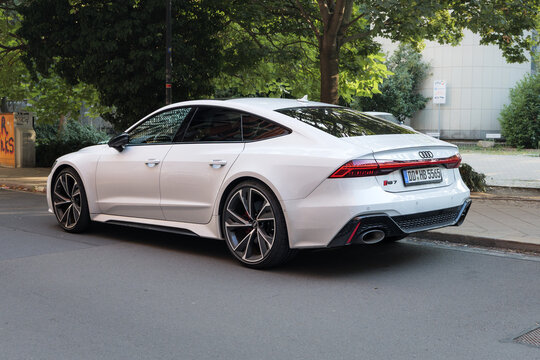 DRESDEN, GERMANY - 4. August 2026: Audi RS7 C8 in white color parking on street. Sporty hatchback design of car. Powerful premium vehicle of German manufacturer.