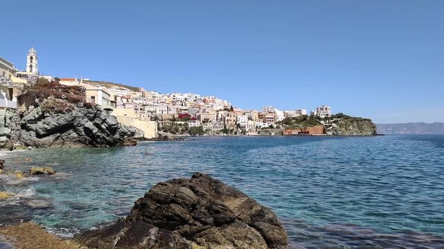 View of the picturesque Vaporia district and Agios Nikolaos Church viewed from Kymata, a coastal quarter of Ermoupoli on Syros island, Greece.