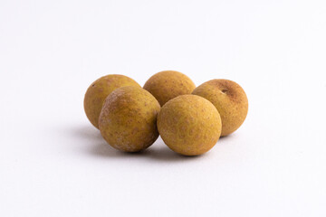 Fototapeta premium Fresh sweet longan fruit isolated on a clean white background