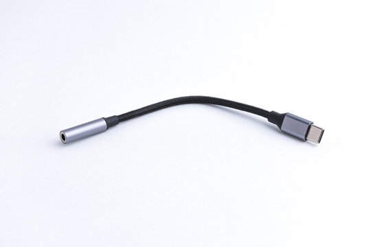 Short USB Type C to audio jack adapter cable isolated on white background