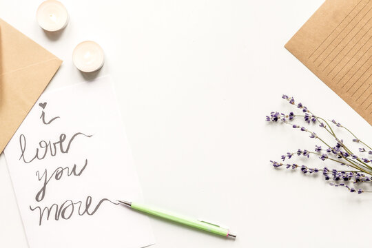 concept of Valentine Day love letter white background top view