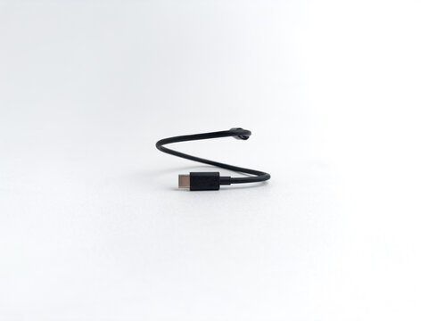 Short black USB type C data and charging cable isolated on white background