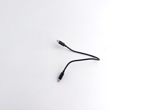 Short black USB type C data and charging cable isolated on white background