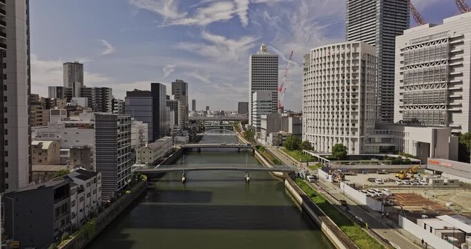 Osaka Japan Aerial v43 low flyover along Tosabori River and Nakanoshima, revealing bridges and Nishi, Kita and Fukushima downtown - Shot with Mavic 3 Pro Cine - Oct 9th 2023