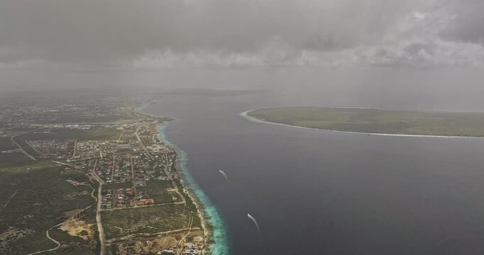 Bonaire Caribbean Netherlands Aerial v57 high descending flyover over Santa Barbara Crowns and Hato toward Kralendijk, Klein Bonaire and clouded coast - Shot with Mavic 3 Pro Cine - Feb 3rd 2024