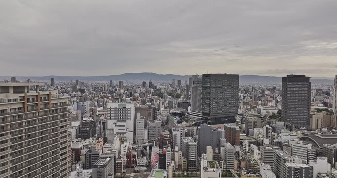 Osaka Japan Aerial v128 low flyover above Minatomachi and Nanbanaka, revealing Namba, Nanbasennichimae and Naniwa and Chuo skyline - Shot with Mavic 3 Pro Cine - Oct 10th 2023