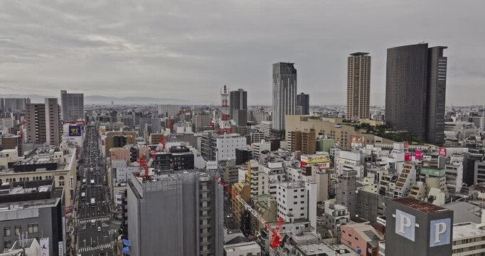 Osaka Japan Aerial v115 low flyover above Nanbasennichimae, Nanbanaka and Nipponbashi, revealing Namba, Naniwa and Chuo under overcast skies - Shot with Mavic 3 Pro Cine - Oct 10th 2023
