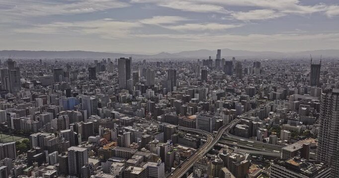 Osaka Japan Aerial v37 tracking flyover across Edobori, Kyomachibori and Utsubohonmachi, revealing dense Nishi Ward office and residential blocks - Shot with Mavic 3 Pro Cine - Oct 9th 2023