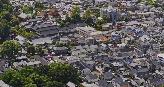 Kyoto Japan Aerial v20 telephoto birds-eye flyover above Fukakusa Kaidocho, revealing Fushimi Inari entrance, university campus and city blocks - Shot with Mavic 3 Pro Cine - Oct 7th 2023
