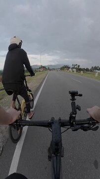 First Person View of Cycling on a Road