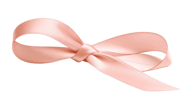 Delicate peach satin ribbon tied in a bow, isolated on transparent background