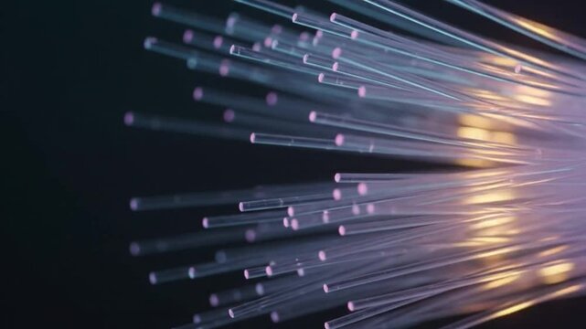 Abstract fiber optic light pulses traveling rapidly through microscopic data cables