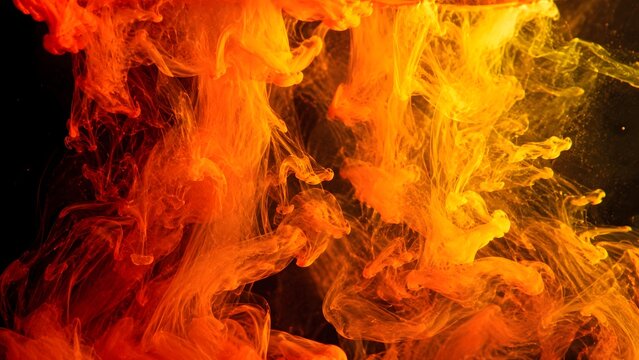 Swirling orange and yellow liquid patterns in dark background Generative AI