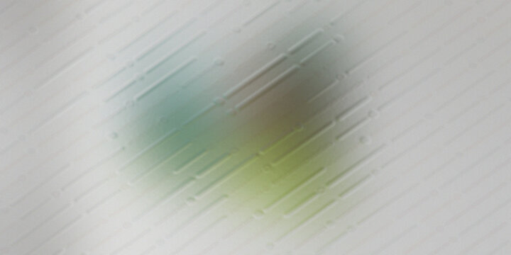 Abstract background featuring soft focus geometric dashed line pattern.
