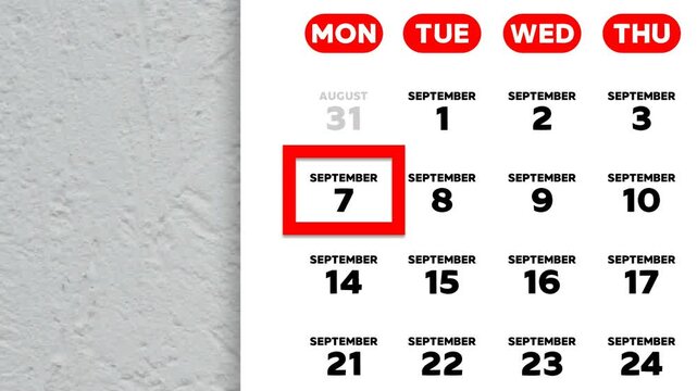 Red cursor highlighting September 7th on a 2026 wall calendar page