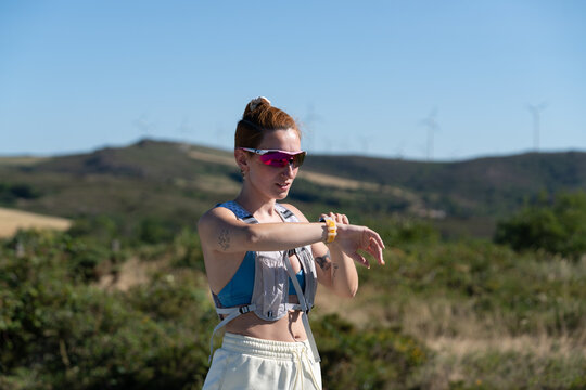 White Woman checking fitness watch