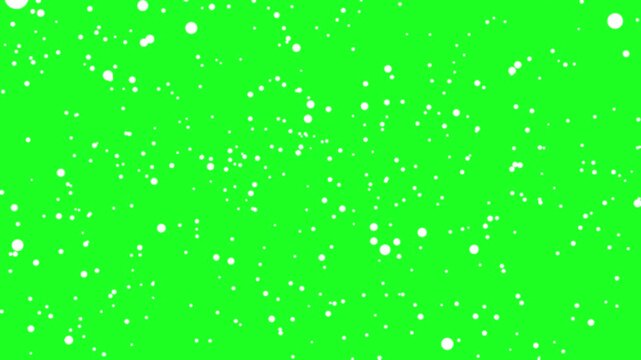 Floating white particles on a bright green chroma key background, perfect for adding versatile digital effects like snow, dust, or glittering elements in post-production video editing and motion graph