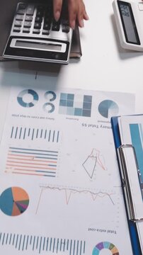 Asian business adviser meeting to analyze and discuss the situation on the financial report in the meeting room.Investment Consultant, Financial advisor and accounting concept