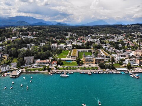 Worthersee mountain lake in Austrian Alps. Austria landscape in State of Carinthia. Town of Velden am Worther See. Drone point of view.