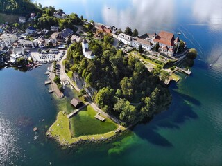 Fototapeta premium Austria drone view. Traunkirchen on beautiful Lake Traun (Traunsee) in Traunviertel region.