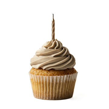 Birthday cupcake with single gold candle isolated on a transparent background for celebratory party design