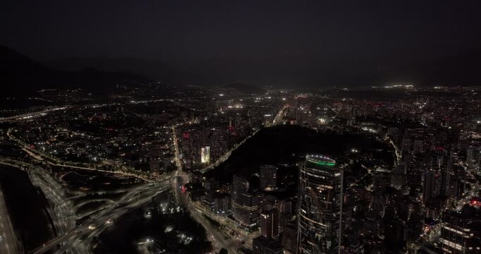 Santiago Chile Aerial v30 night orbit revealing Las Condes, Vitacura, Providencia, downtown towers, illuminated highways and city lights - Shot with Mavic 3 Pro Cine - Jan 20th 2025