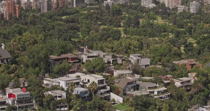 Santiago Chile Aerial v22 telephoto birds-eye flyover around Las Condes and Barrio El Golf, showing luxury homes, parkland and apartments - Shot with Mavic 3 Pro Cine - Jan 20th 2025