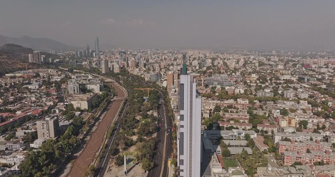 Santiago Chile Aerial v50 flyover along Mapocho River parks, revealing Bellavista, Recoleta, Providencia and San Cristobal hillside - Shot with Mavic 3 Pro Cine - Jan 24th 2025