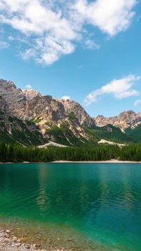 Lago di Braies in Dolomites,, Italy. Vertical Timelapse of Idyllic Landscape on Sunny Summer Day
