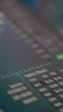 Tablet financial dashboard stock market data interactive analytics display. Close-up hands holding digital tablet showing real-time investment data