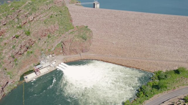 Aerial drone view of the Ord River Dam wall and water release spillway at Lake Argyle near Kununurra, Western Australia.