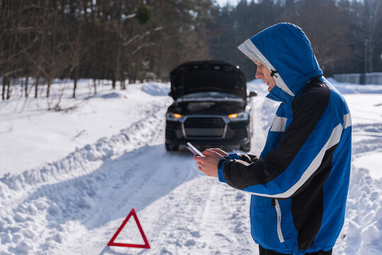 Driver seek roadside assistance after winter car breakdown