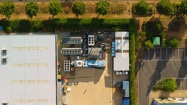 Aerial view of HVAC ventilation and server cooling units installed on the grounds of an innovation campus in Harwell Oxford, England, United Kingdom.