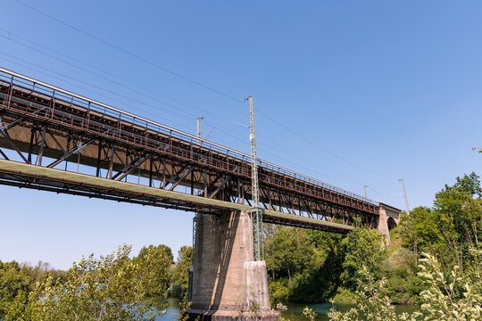 Historic Railway Bridge over the Lech River in Landsberg am Lech, Germany on a Sunny Day