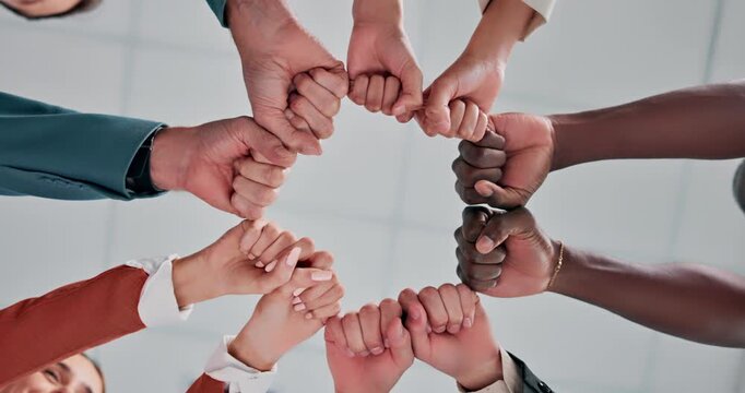 Hands, business and people in office with fist bump, good news and real estate success for celebration. Below, staff and team achievement for property deal, realtor motivation and auction milestone