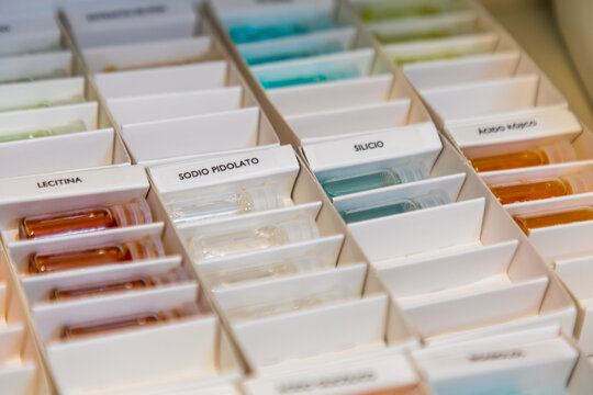 Assorted skincare treatment ampoules in clinic organizer