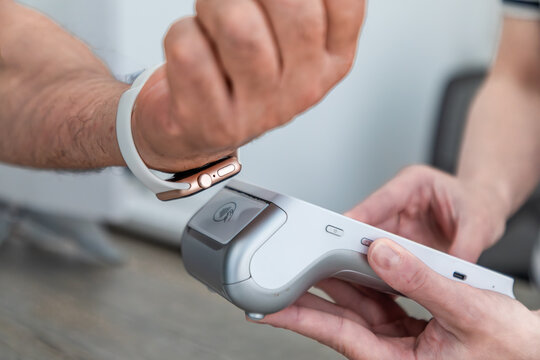 Contactless payment with smartwatch at skincare clinic