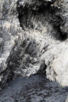 Basalt rock formation at Icelandic volcanic coastline