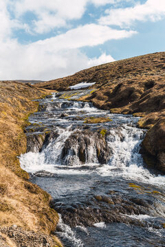 Cascade waterfall in Icelandic highland landscape