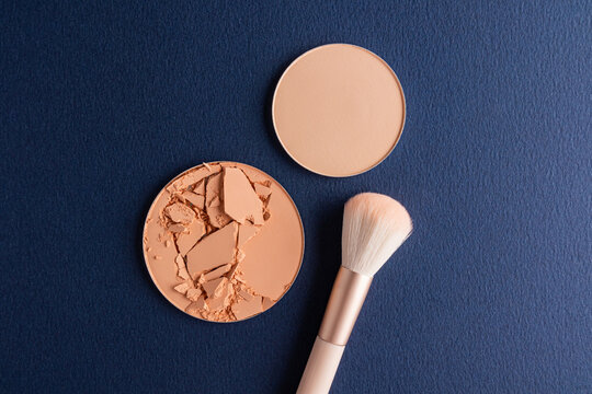 Broken dry powder makeup refill with cosmetic brush