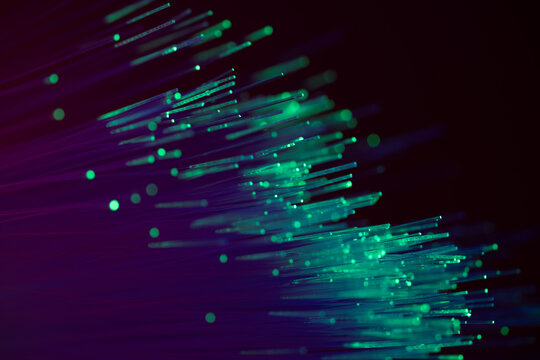 Glowing fiber optic strands for digital data transmission