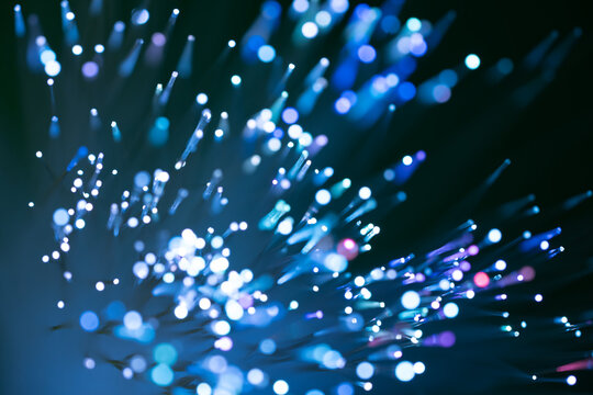 Blue fiber optic light network abstract technology background