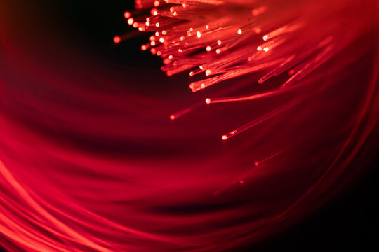 Red fiber optic strands for high-speed data transmission