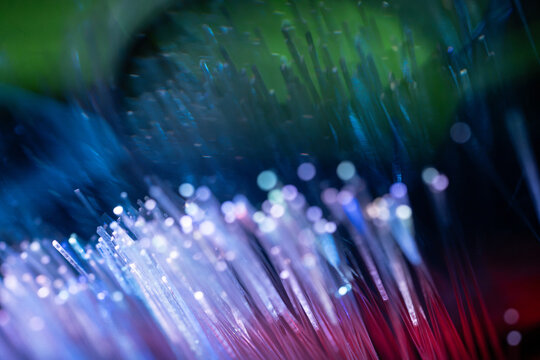 Abstract fiber optic technology background with colorful light