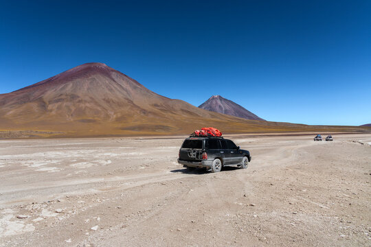 Off-road vehicle crossing high altitude desert in Bolivia