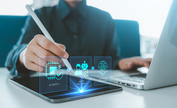 AI safety and governance concept person using stylus pointing at tablet digital hologram artificial intelligence safety protocols and governance framework for ethical integration and data privacy