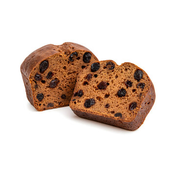 Sliced loaf of rich, spiced fruit cake with dried raisins and a moist texture.
