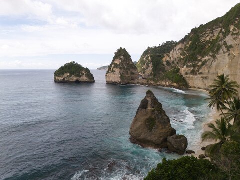 Dramatic sea stacks and cliffs on Bali coast, Indonesia
