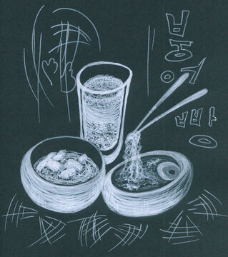 White disches with asian food on the black background
